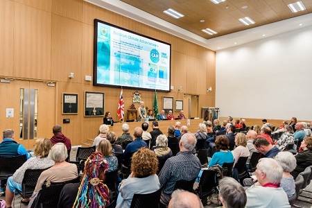 Attendees to the Forum watching a speaker at the Dacorum CAN annual event in 2022