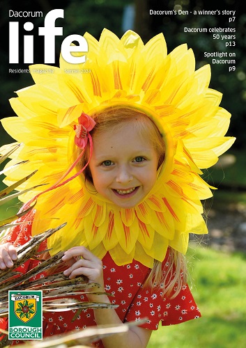 Dacorum Life magazine front cover featuring a girl in red top wearing a sunflower headdress